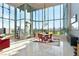 Open concept dining area with city views and modern chandelier at 360 E Desert Inn Rd # 1201, Las Vegas, NV 89109