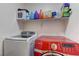 Laundry room with washer and dryer, and storage shelving at 3728 Spiritual Way, Las Vegas, NV 89115