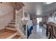 Wooden staircase with white railing leading to the second floor at 3728 Spiritual Way, Las Vegas, NV 89115