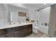 Clean bathroom with tub, shower, and dark wood vanity at 3792 Nerine Pass Way Ave, North Las Vegas, NV 89031