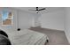 Main bedroom with ceiling fan, window, and carpet at 3792 Nerine Pass Way Ave, North Las Vegas, NV 89031