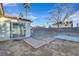 Backyard with a patio, grassy area, and access to a sunroom at 3849 Boca Chica Ave, Las Vegas, NV 89120