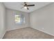 Well-lit bedroom with ceiling fan and neutral wall colors at 3849 Boca Chica Ave, Las Vegas, NV 89120