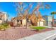 House exterior with well-maintained front yard landscaping at 3918 Champagne Wood Dr, North Las Vegas, NV 89031