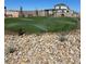 Landscaped grassy area with irrigation and rock border at 4205 Yucca Brevi Ave, Las Vegas, NV 89139