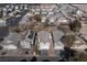 Aerial view of a two-story house with solar panels, in a neighborhood at 4358 Raynham St, Las Vegas, NV 89115