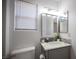 Small bathroom with single sink vanity and shower/tub at 4358 Raynham St, Las Vegas, NV 89115