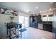 Modern kitchen with dark cabinets and stainless steel appliances at 4358 Raynham St, Las Vegas, NV 89115