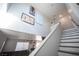 Modern staircase with gray and white accents at 4358 Raynham St, Las Vegas, NV 89115