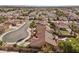 Aerial view showcasing a house, pool, and surrounding neighborhood at 4609 Snowpoint Ct, Las Vegas, NV 89130