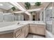 Bathroom with double vanity and large mirror at 4609 Snowpoint Ct, Las Vegas, NV 89130