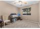 Bright bedroom with ceiling fan and window at 4609 Snowpoint Ct, Las Vegas, NV 89130