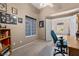 Home office with built-in shelving and view at 4609 Snowpoint Ct, Las Vegas, NV 89130