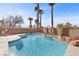 Sparkling kidney-shaped pool with flagstone deck at 4609 Snowpoint Ct, Las Vegas, NV 89130