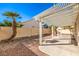 Backyard with pergola covered patio and gravel landscaping at 4861 Camino Sombrero, North Las Vegas, NV 89031