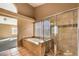 Relaxing bathroom with soaking tub and separate shower at 4861 Camino Sombrero, North Las Vegas, NV 89031