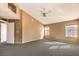 Bright bedroom featuring gray carpet and a ceiling fan at 4861 Camino Sombrero, North Las Vegas, NV 89031