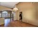 Open dining area with kitchen and living room view at 4861 Camino Sombrero, North Las Vegas, NV 89031