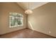 Dining area with hardwood floor and chandelier at 4861 Camino Sombrero, North Las Vegas, NV 89031