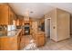 Spacious kitchen with granite countertops and an island at 4861 Camino Sombrero, North Las Vegas, NV 89031