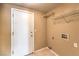 Laundry room with built-in shelving at 4861 Camino Sombrero, North Las Vegas, NV 89031