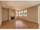 Living room with fireplace and hardwood floors at 4861 Camino Sombrero, North Las Vegas, NV 89031