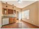 Wet bar with wood cabinets and granite top at 4861 Camino Sombrero, North Las Vegas, NV 89031