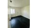 Bright bedroom with dark flooring and neutral walls at 4981 Alondra Dr, Las Vegas, NV 89118