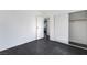 Clean bedroom featuring neutral walls, modern flooring, and closet at 4981 Alondra Dr, Las Vegas, NV 89118