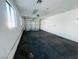 Garage with large door and concrete floor at 4981 Alondra Dr, Las Vegas, NV 89118