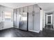 Kitchen with gray cabinetry, stainless steel refrigerator, and access to the hallway at 4981 Alondra Dr, Las Vegas, NV 89118