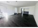 Spacious living room with dark hardwood floors at 4981 Alondra Dr, Las Vegas, NV 89118