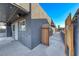 Side yard access with wooden gate and patio area at 5124 Brownwood Ave, Las Vegas, NV 89122