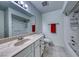 Bathroom with granite countertop and bathtub at 5124 Brownwood Ave, Las Vegas, NV 89122