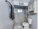 Clean bathroom with shower/tub combo and storage at 5124 Brownwood Ave, Las Vegas, NV 89122