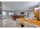 Bright dining area with wood table and white chairs at 5124 Brownwood Ave, Las Vegas, NV 89122