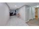 Bright hallway with tile flooring leading to living areas at 5124 Brownwood Ave, Las Vegas, NV 89122