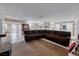 Living room with sectional sofa and views into dining area at 5124 Brownwood Ave, Las Vegas, NV 89122