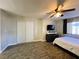 Bedroom with sliding door closet and wood flooring at 5320 Duralite St # 102, Las Vegas, NV 89122