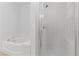 Bathroom with soaking tub and walk-in shower at 5400 Flowing Spring St, Las Vegas, NV 89122