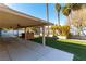 Covered patio with hot tub and ceiling fan at 57 Marion Dr, Las Vegas, NV 89110