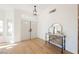 Light and airy entryway with double doors and a console table at 5904 Willowcreek Rd, North Las Vegas, NV 89031