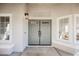 Elegant entryway with double doors and sidelights at 5904 Willowcreek Rd, North Las Vegas, NV 89031