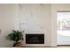 Modern fireplace with marble surround at 5904 Willowcreek Rd, North Las Vegas, NV 89031