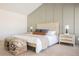 Main bedroom with gray accent wall and plush bedding at 5904 Willowcreek Rd, North Las Vegas, NV 89031