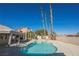 Relaxing kidney shaped pool in sunny backyard at 5904 Willowcreek Rd, North Las Vegas, NV 89031