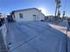 Ranch style home with large driveway and desert landscaping at 6229 Cromwell Ave, Las Vegas, NV 89107