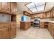 Kitchen with wood cabinets and stainless steel appliances at 6229 Cromwell Ave, Las Vegas, NV 89107