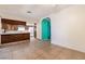 Kitchen with wood cabinets and breakfast bar at 6229 Cromwell Ave, Las Vegas, NV 89107