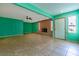 Spacious living room with tile floors and brick fireplace at 6229 Cromwell Ave, Las Vegas, NV 89107